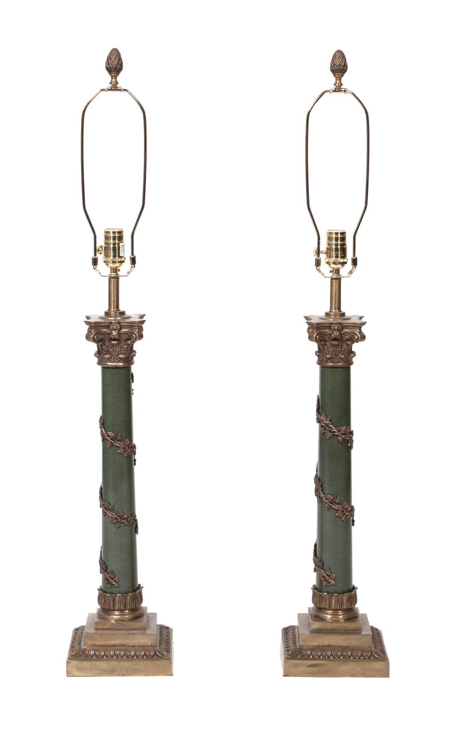 A Pair of Cast Metal Table Lamp Height overall 38 inches. — 20TH CENTURY