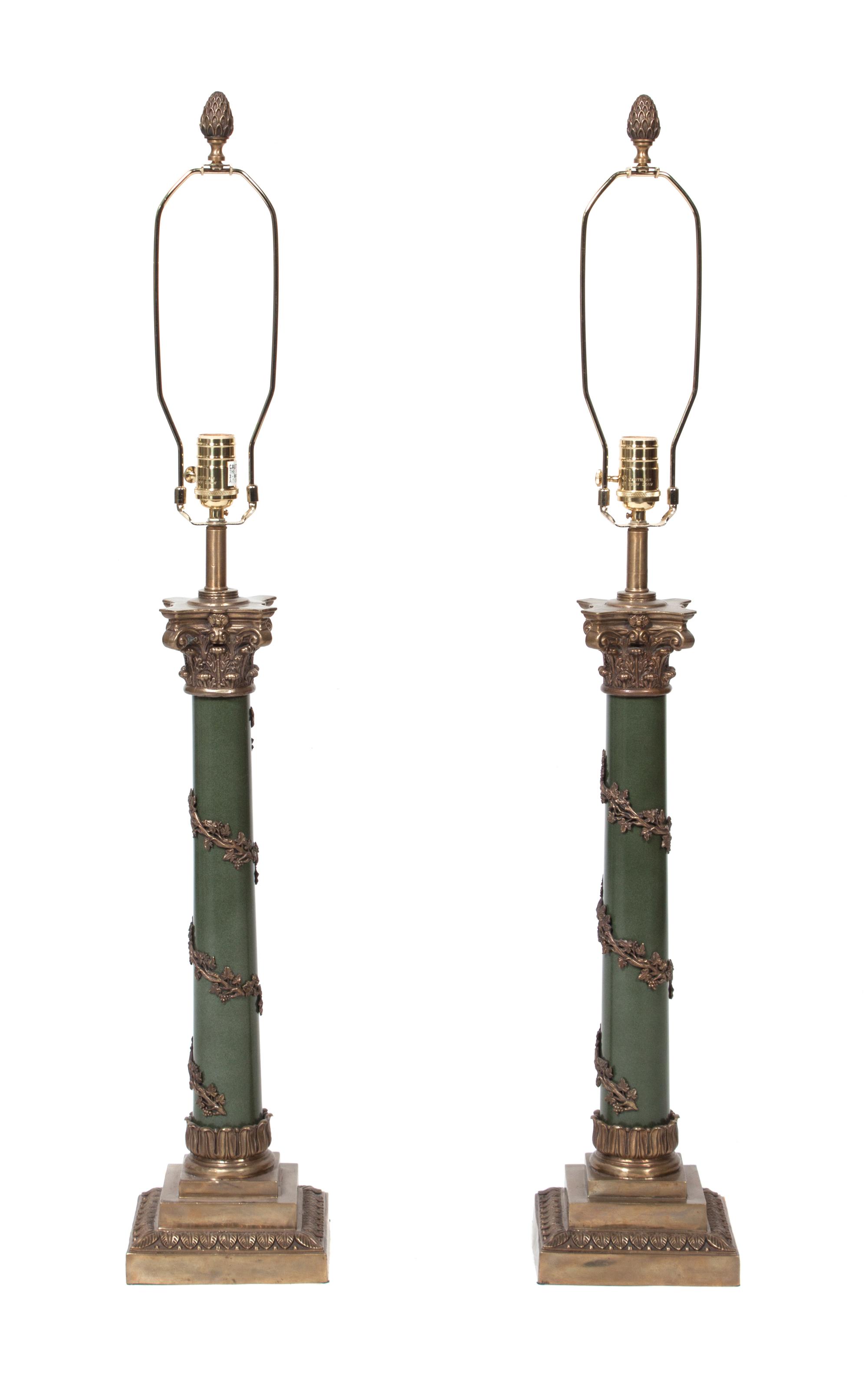 A Pair of Cast Metal Table Lamp Height overall 38 inches. — 20TH CENTURY