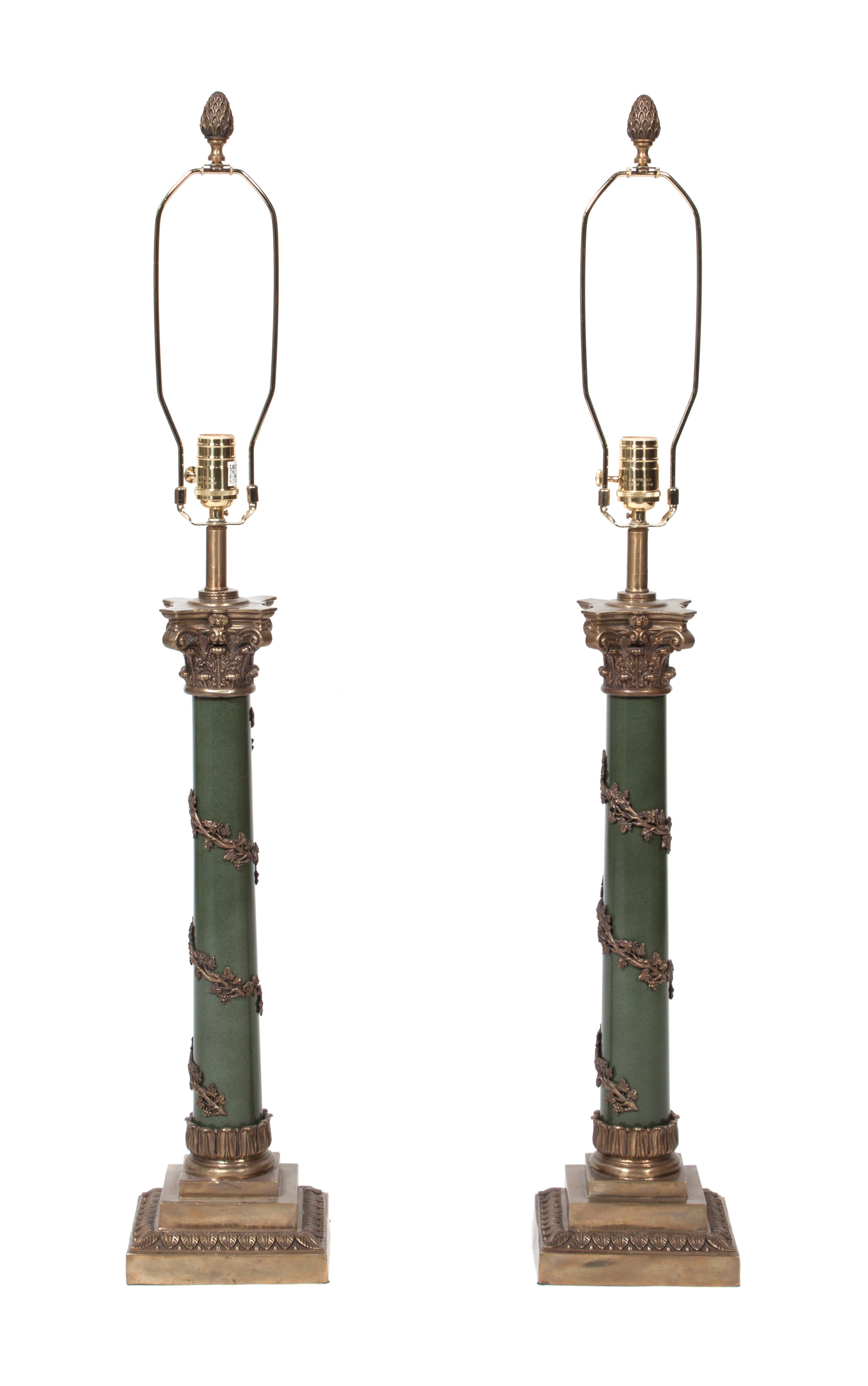 A Pair of Cast Metal Table Lamp Height overall 38 inches. — 20TH CENTURY