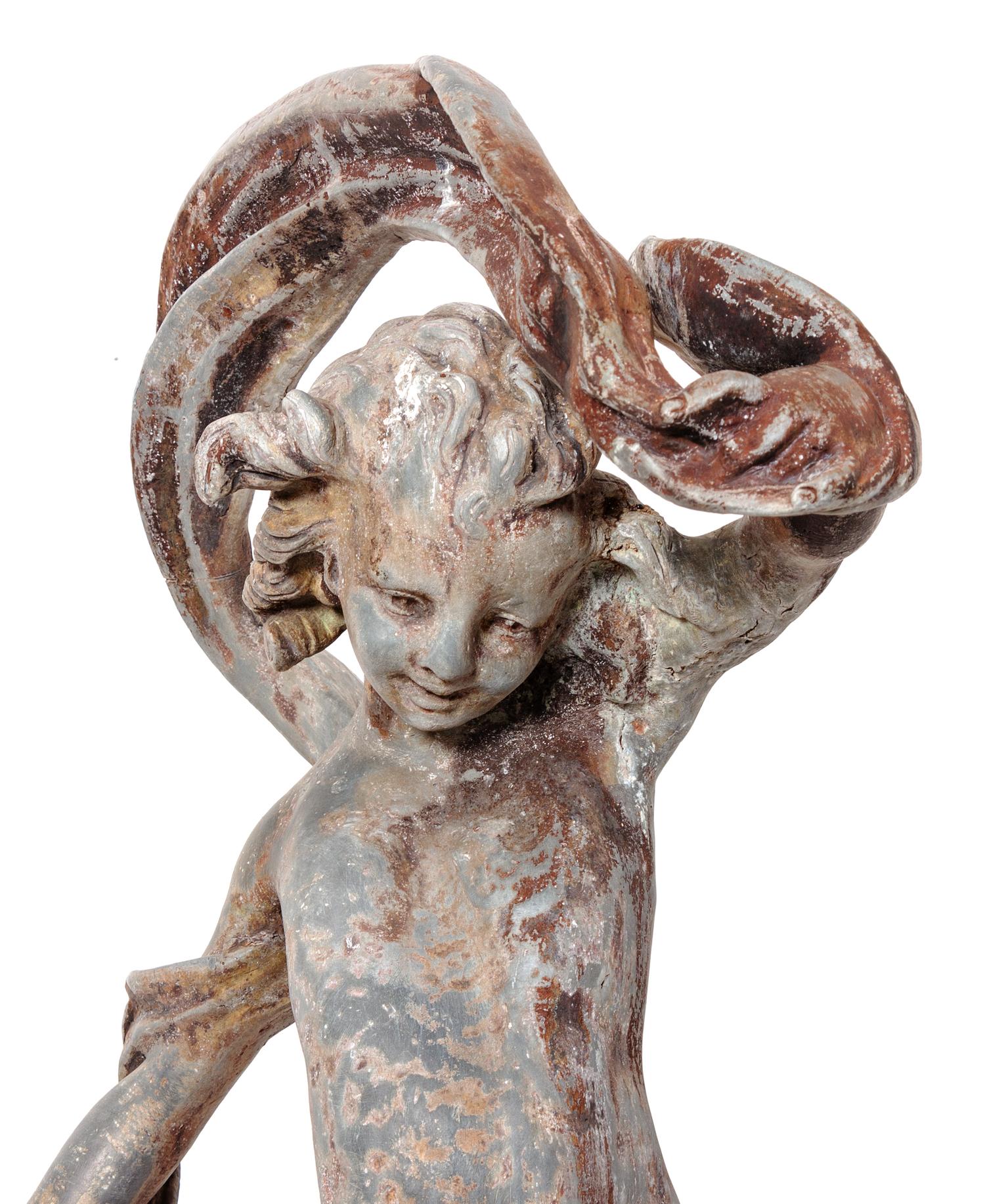 A Cast Lead Fountain Statue