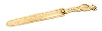 A Novelty Whale Bone Page Turner Length 10 1/4 inches.