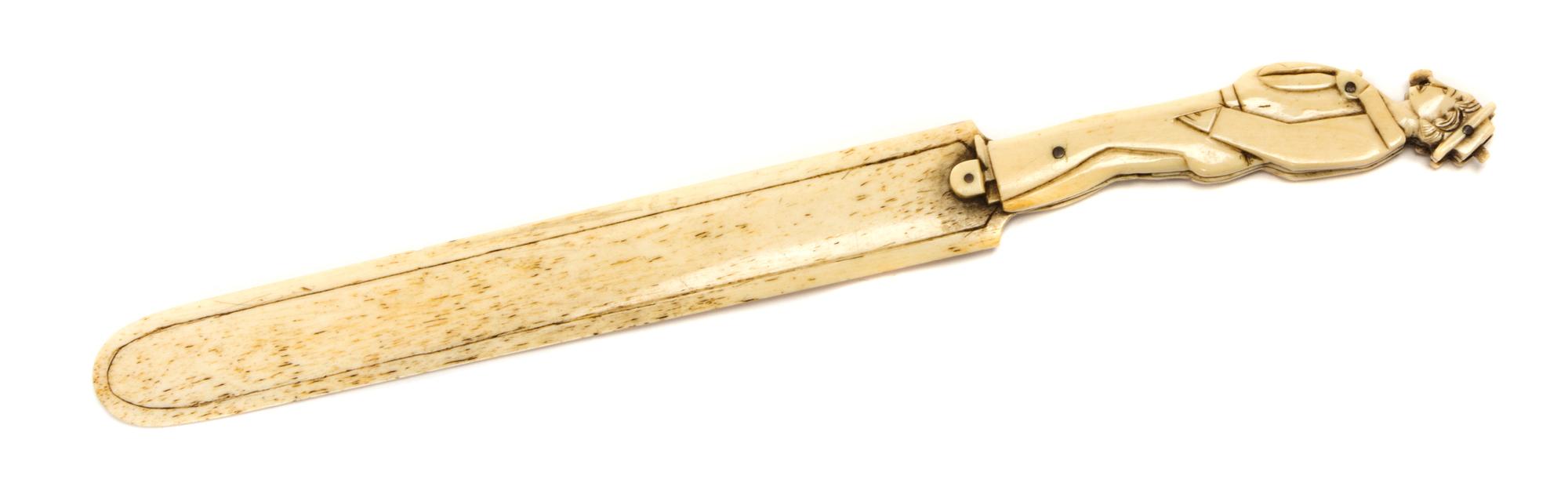 A Novelty Whale Bone Page Turner Length 10 1/4 inches.