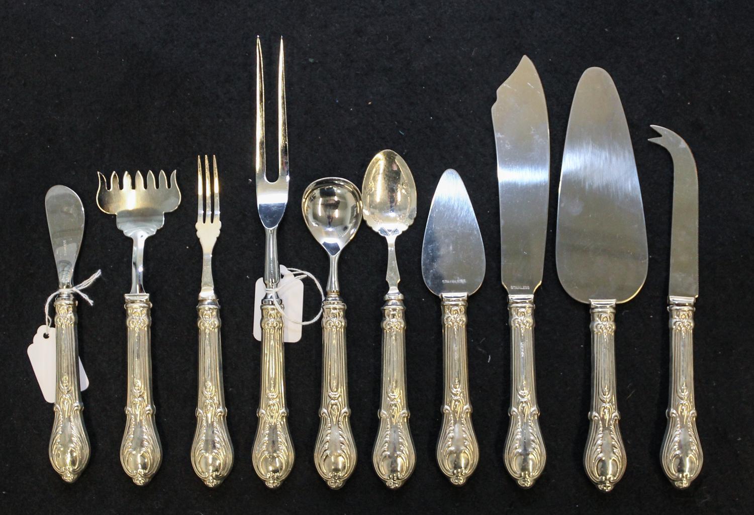 A Set of Ten Silver Handled Serving Articles, , comprising a cake slice, master butter knife, sugar scoop, bar knife, pickle fork, carv