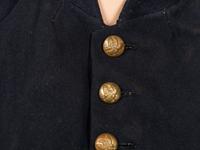 [CIVIL WAR]. A collection of items attributed to Thomas W. Johnson, Co. K, 4th Delaware Infantry, incl. frock coat, cap, belt rig, and cartridge box.