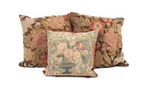 A Collection of Three Needlepoint Pillows Height of largest 19 inches.
