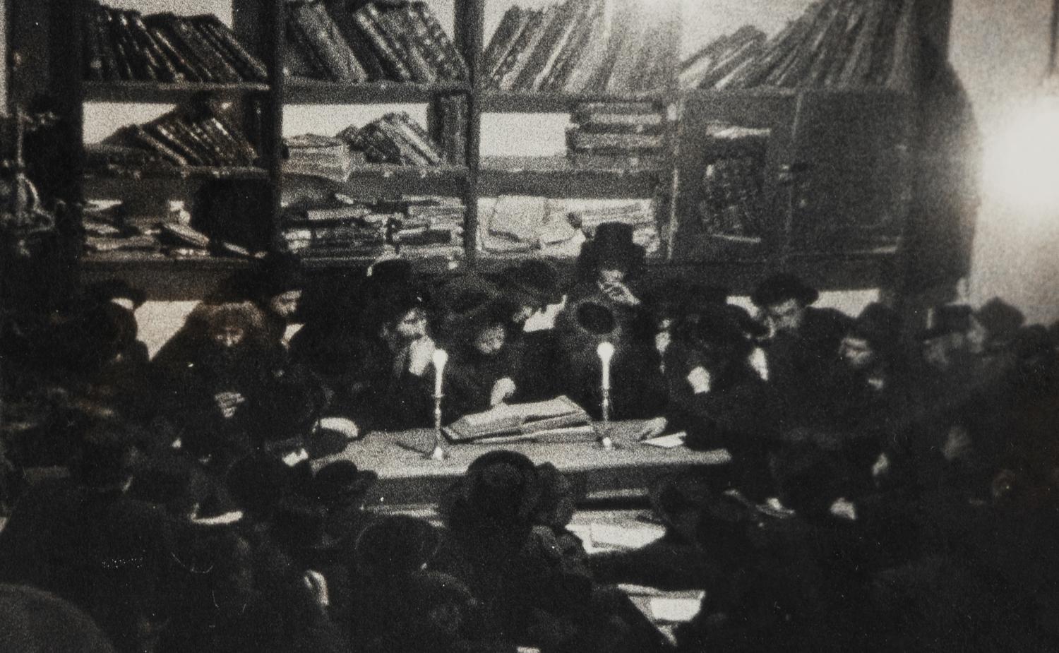 Roman Vishniac (1897-1990) Munkatch, Baruch Rabinovitch examining the Yeshiva, 1938