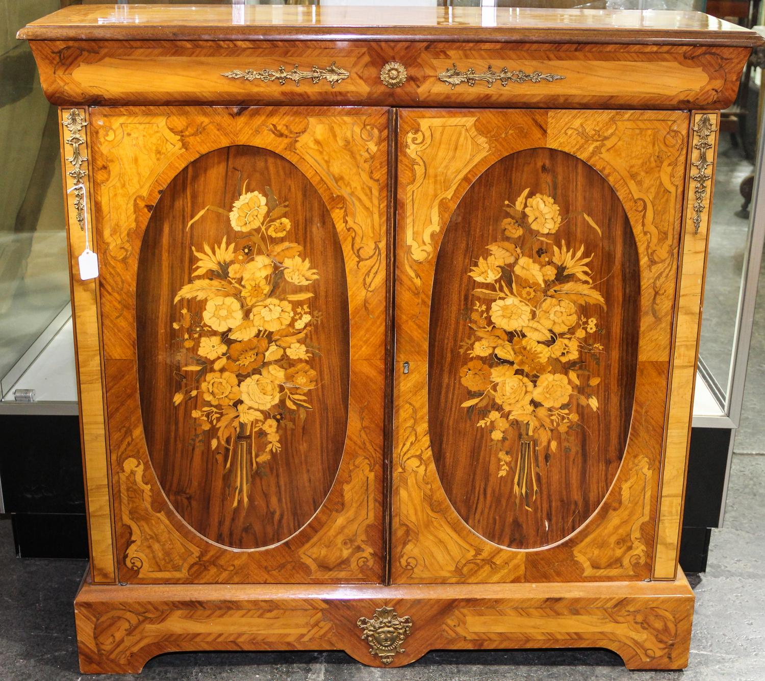 An Italian Marquetry Cabinet. Height 41 x width 40 3/4 x depth 12 1/2 inches.