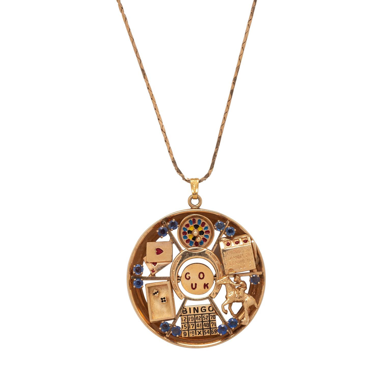 RETRO, YELLOW GOLD, SAPPHIRE AND ENAMEL 'GOOD LUCK' PENDANT/NECKLACE
