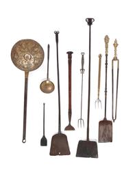 A Group of Wrought-Iron and Brass Hearth Tools