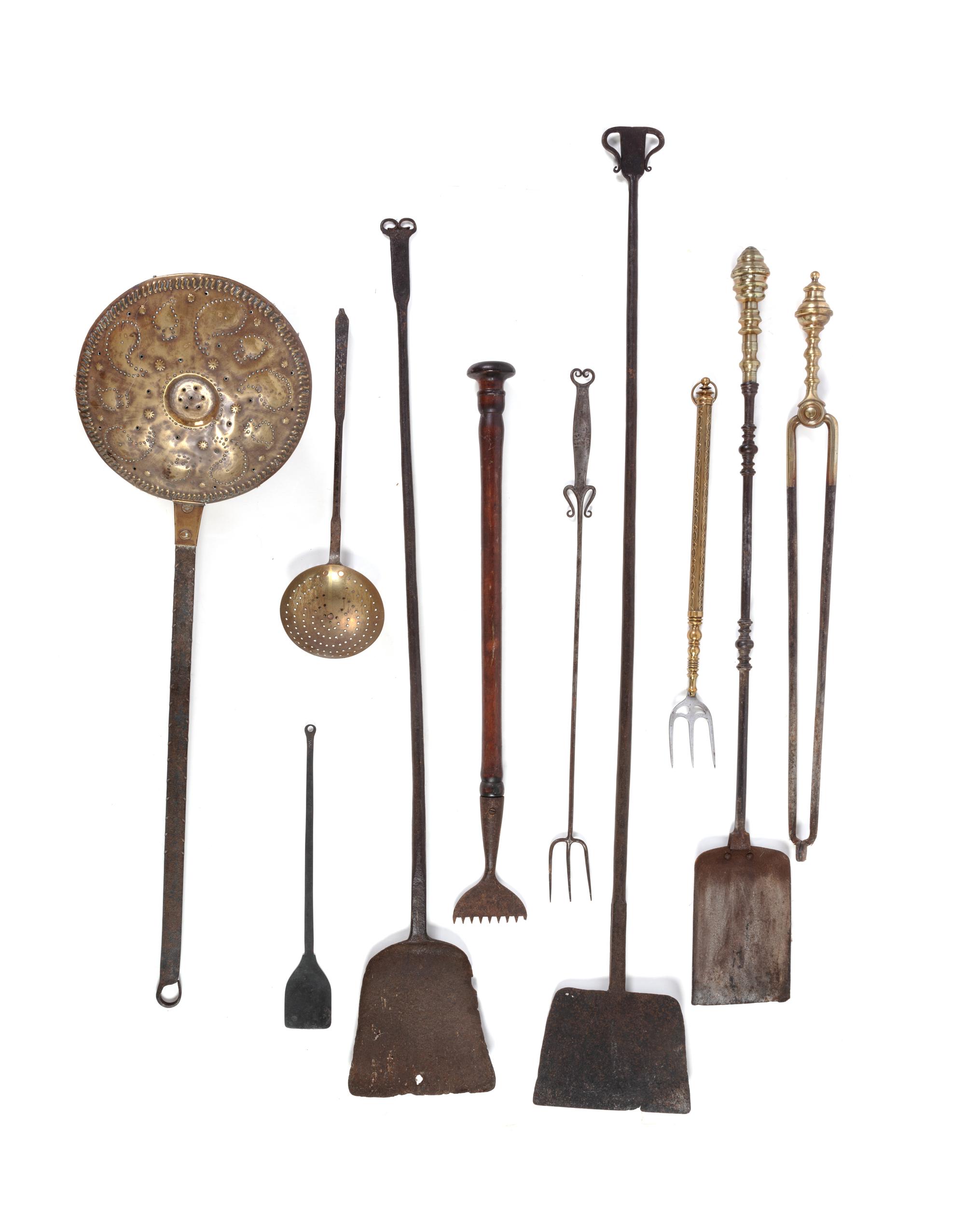 A Group of Wrought-Iron and Brass Hearth Tools
