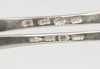 A Matched Pair of George II Silver Sauce Ladles, Example by Samuel Holmes, London, 1748, each terminal engraved with a unicorn.