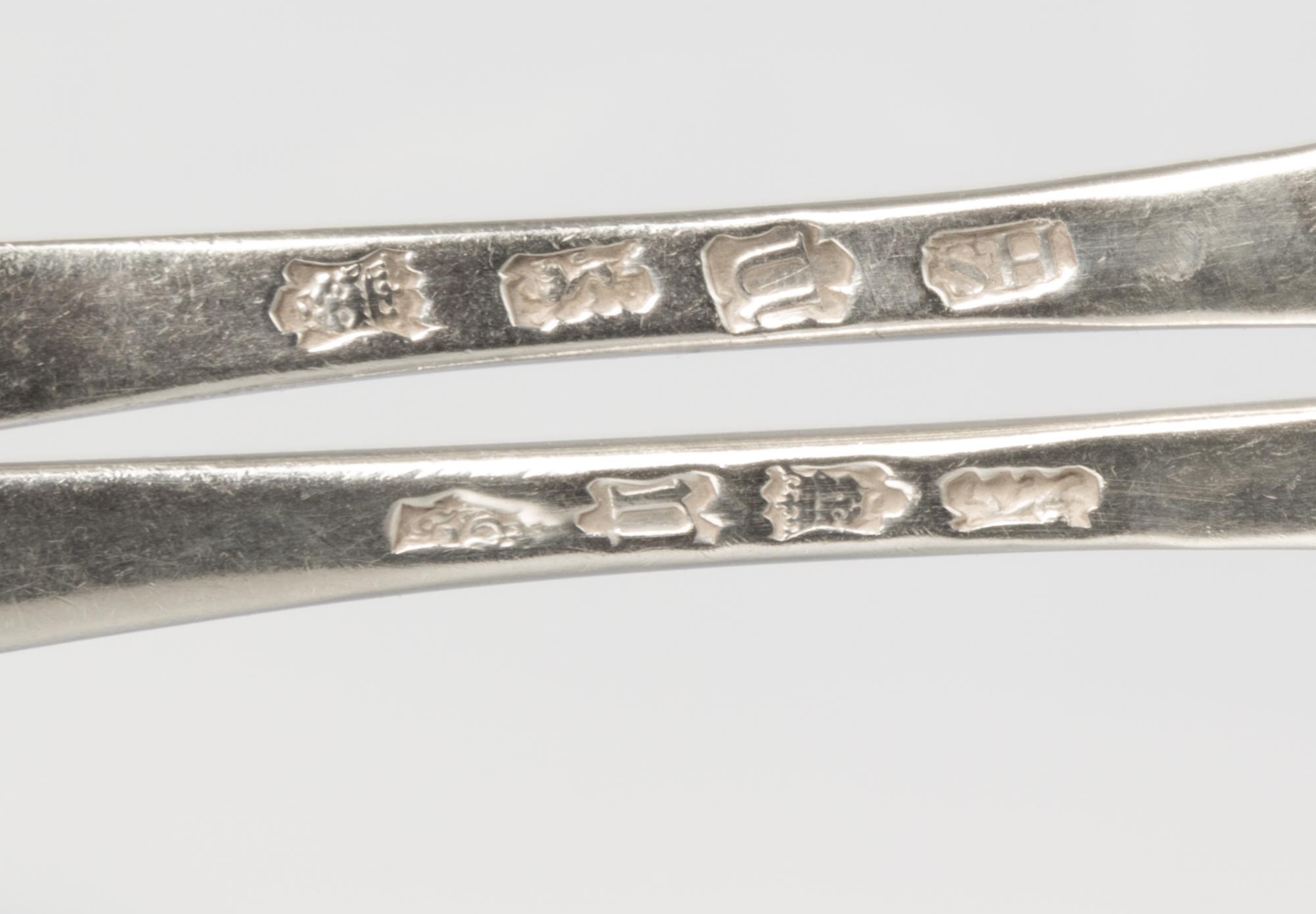 A Matched Pair of George II Silver Sauce Ladles, Example by Samuel Holmes, London, 1748, each terminal engraved with a unicorn.