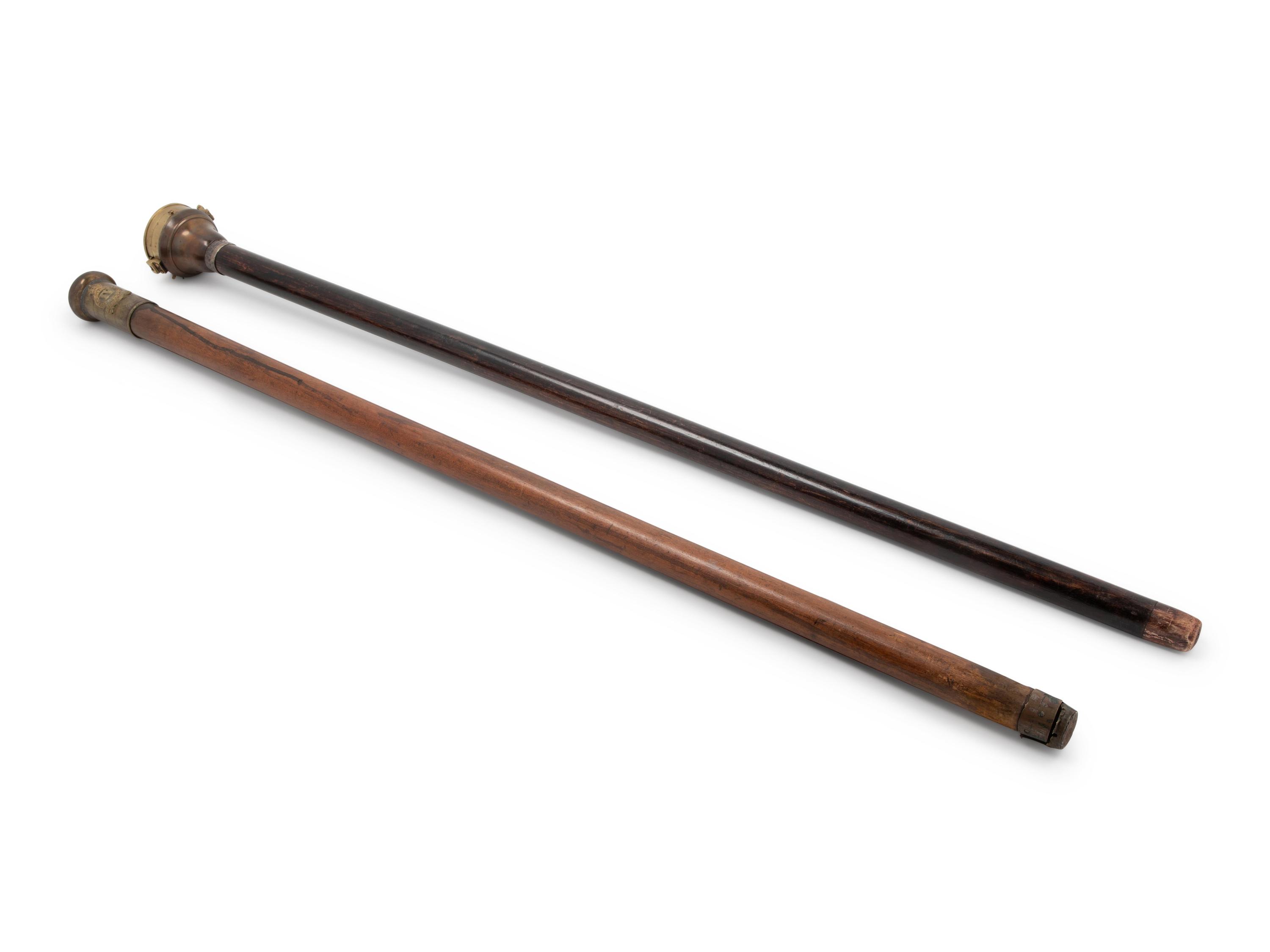 Two English Silver and Brass Mounted Explorer's Walking Sticks