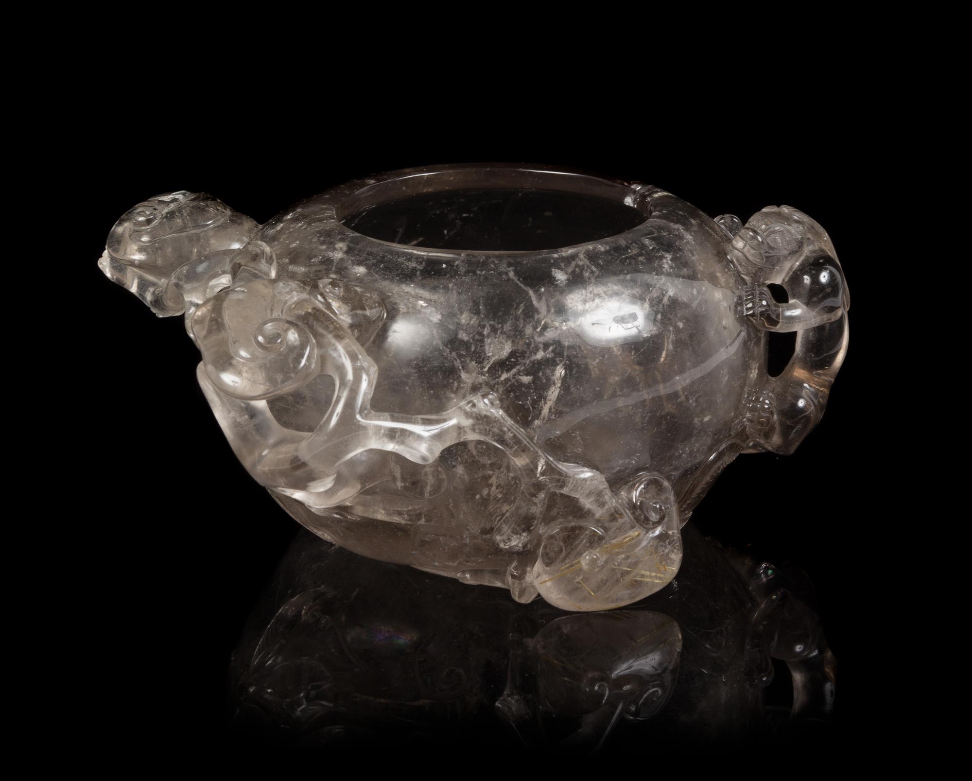 A Rock Crystal Brush Washer Width 5 3/4 inches.
