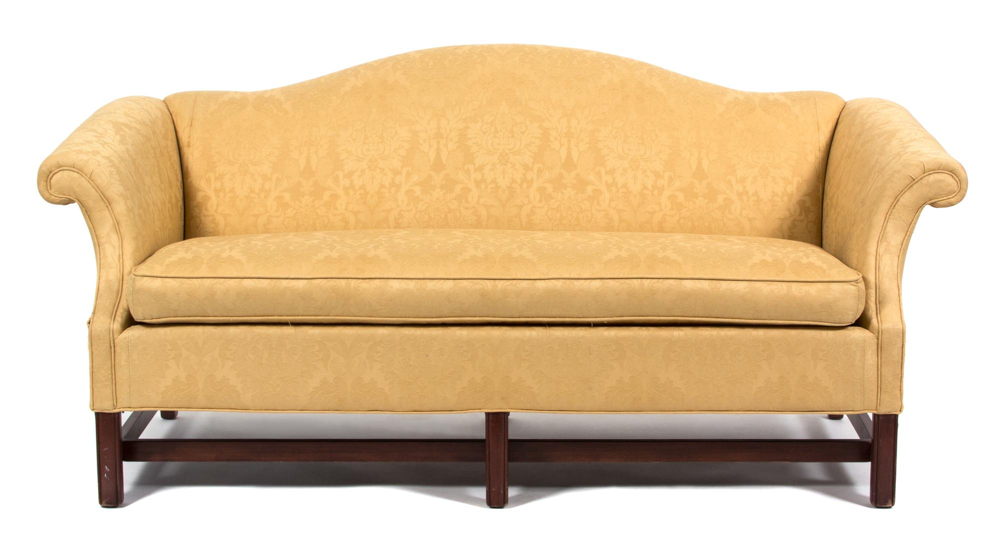 A George II Style Mahogany Camelback Sofa Width 71 inches. — 20TH CENTURY