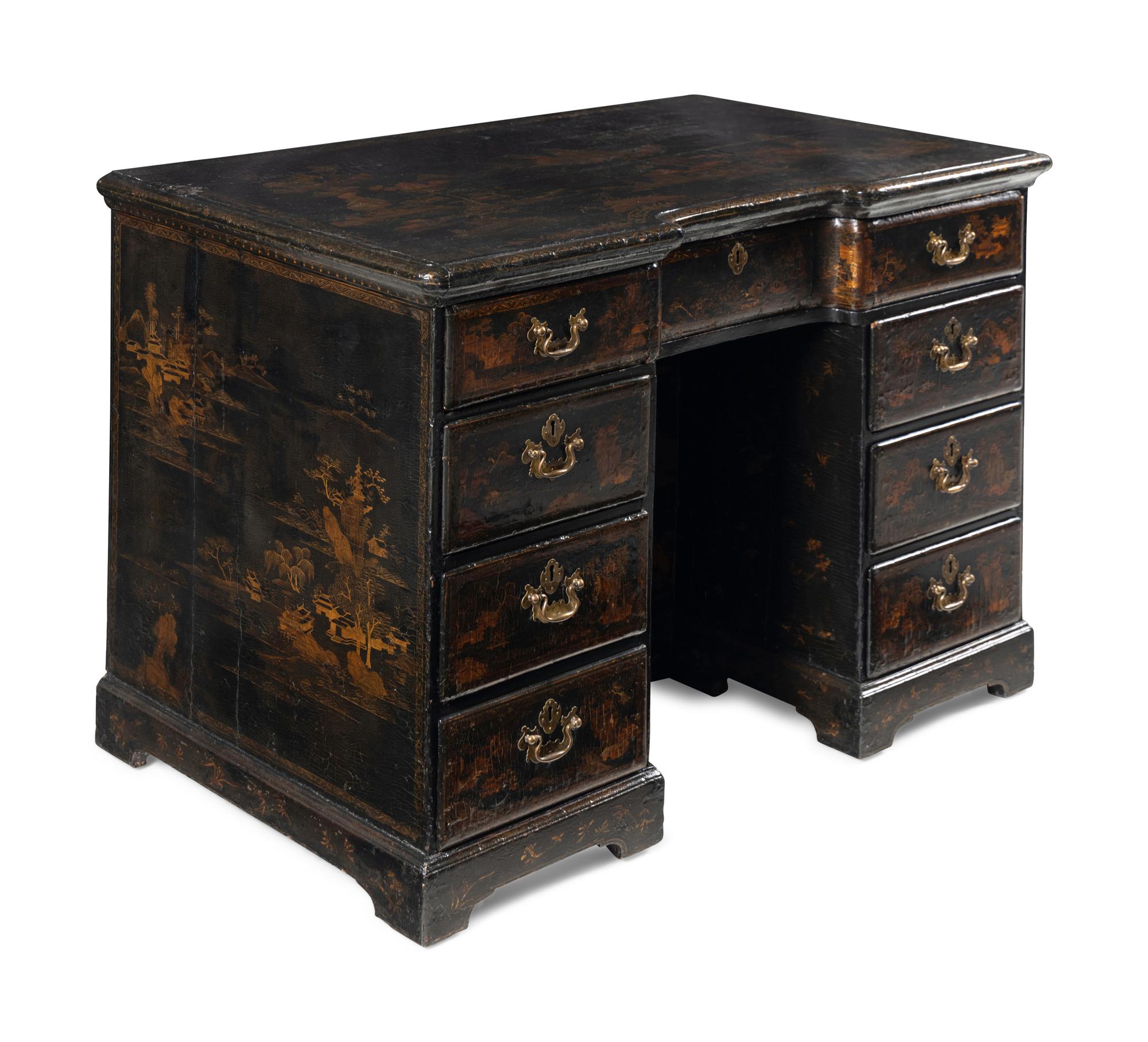 A Chinese Export Black and Gilt Lacquered Kneehole Desk