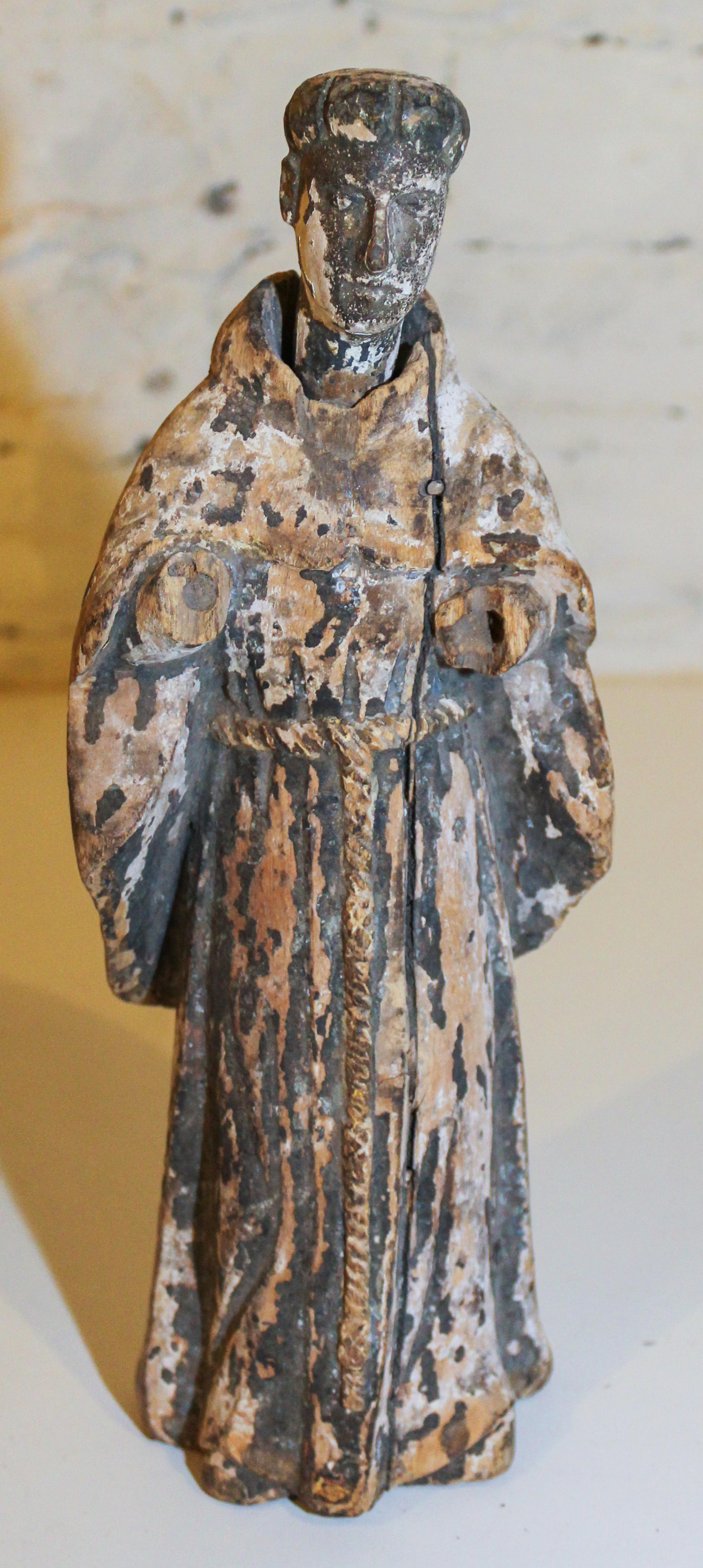 A Southeast Asian Santos Figure. Height 11 1/2 inches.