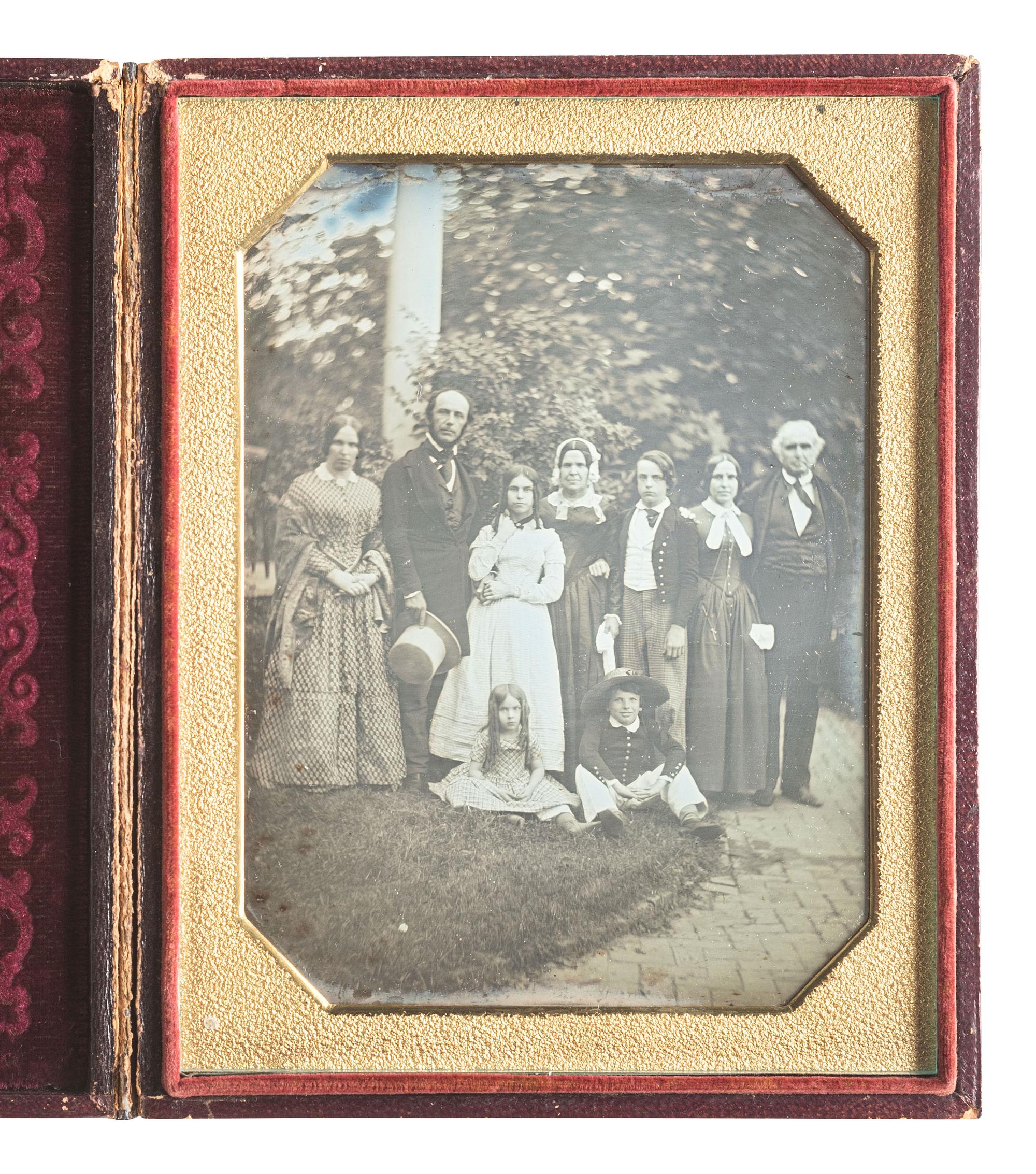 [EARLY PHOTOGRAPHY]. Half plate daguerreotype featuring a multi-generational family posed outdoors.