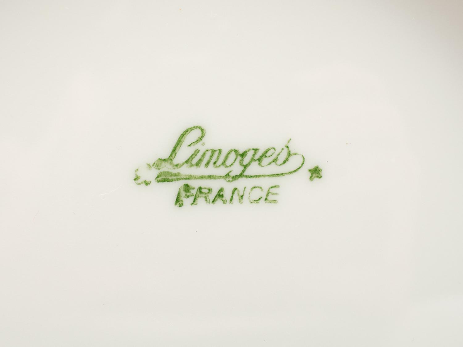 A Set of Four Limoges Porcelain Cache Pots