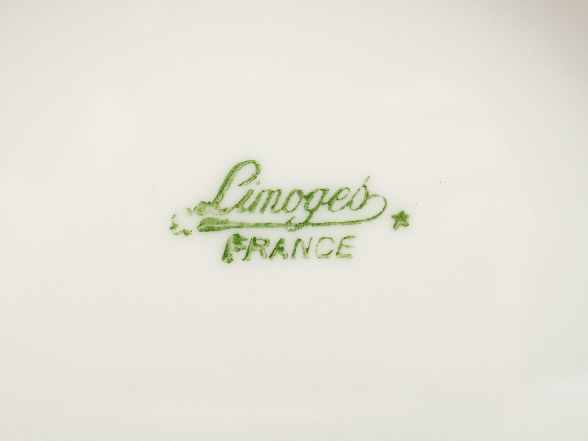 A Set of Four Limoges Porcelain Cache Pots