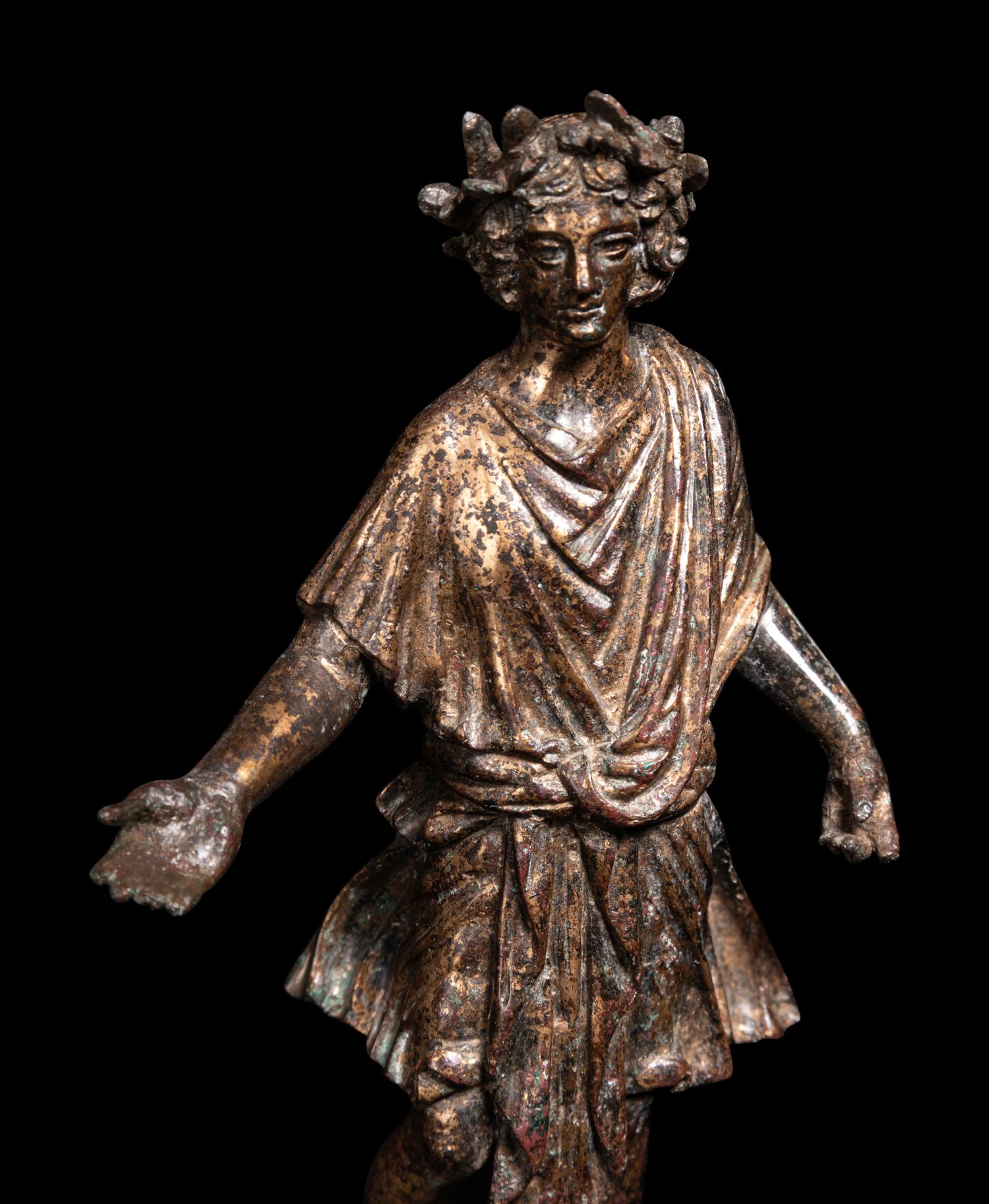 A Roman Gilt Bronze Lar