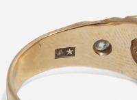 A Ladies 14K Yellow Gold and Diamond Ring