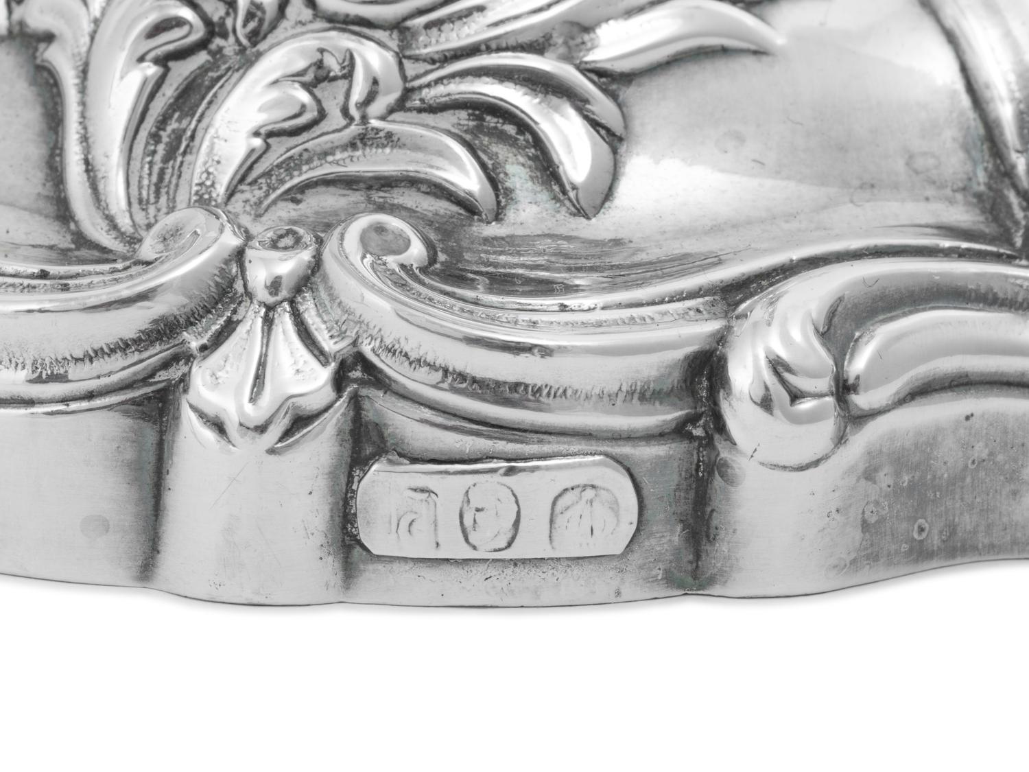 A Pair of Silver Candlesticks