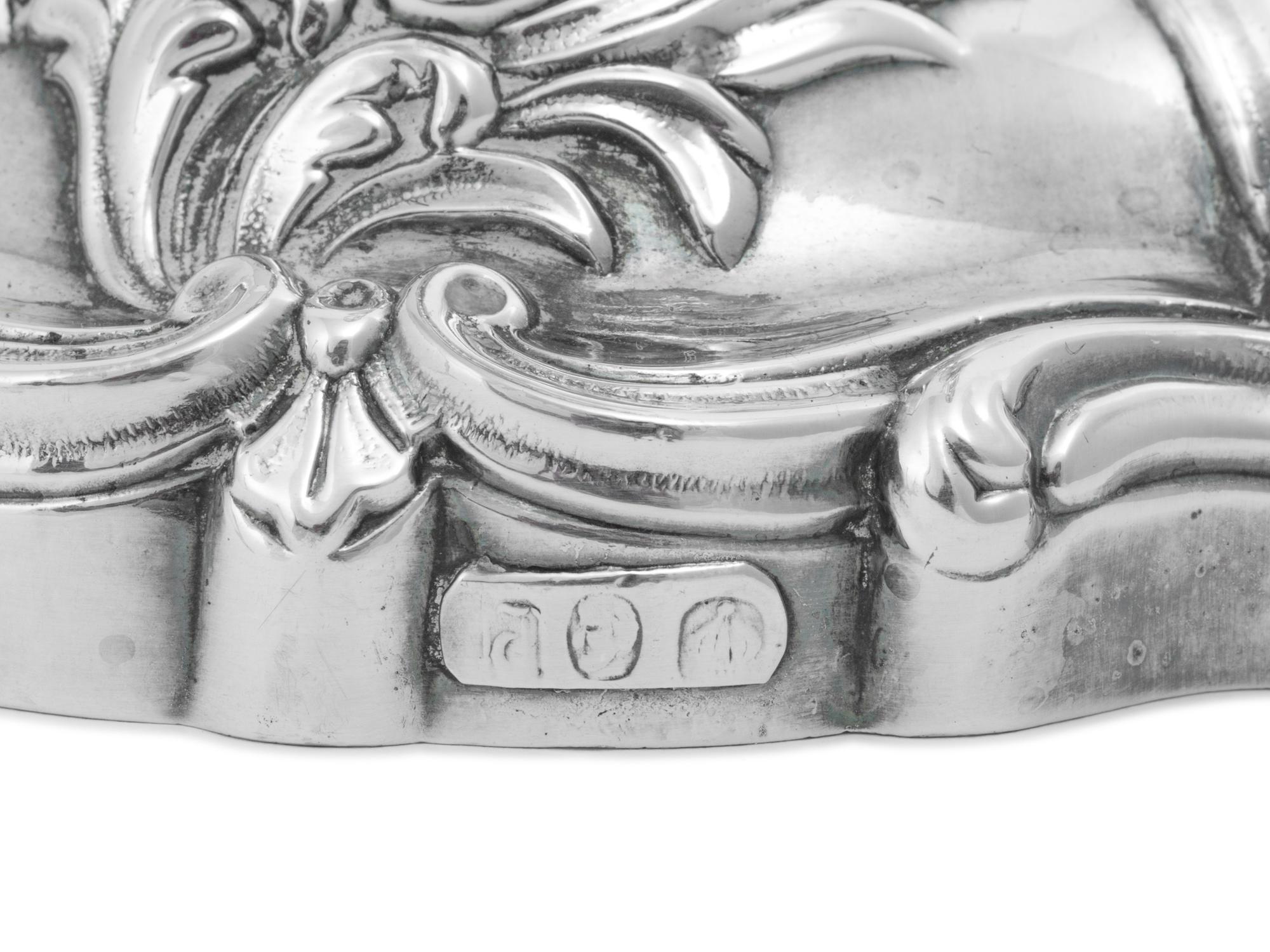 A Pair of Silver Candlesticks