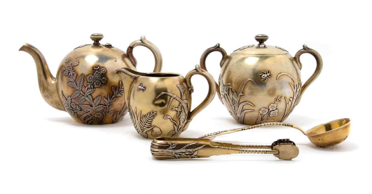 A Russian Gilded Silver Tea Service, Ovchinnikov, Height of tallest 4 1/2 inches.