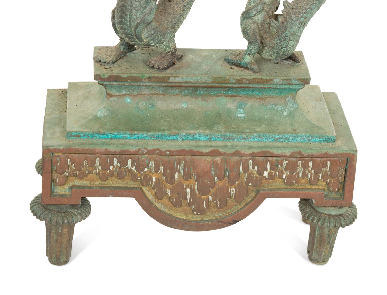 A Pair of Chinese Bronze Dragon Chenets