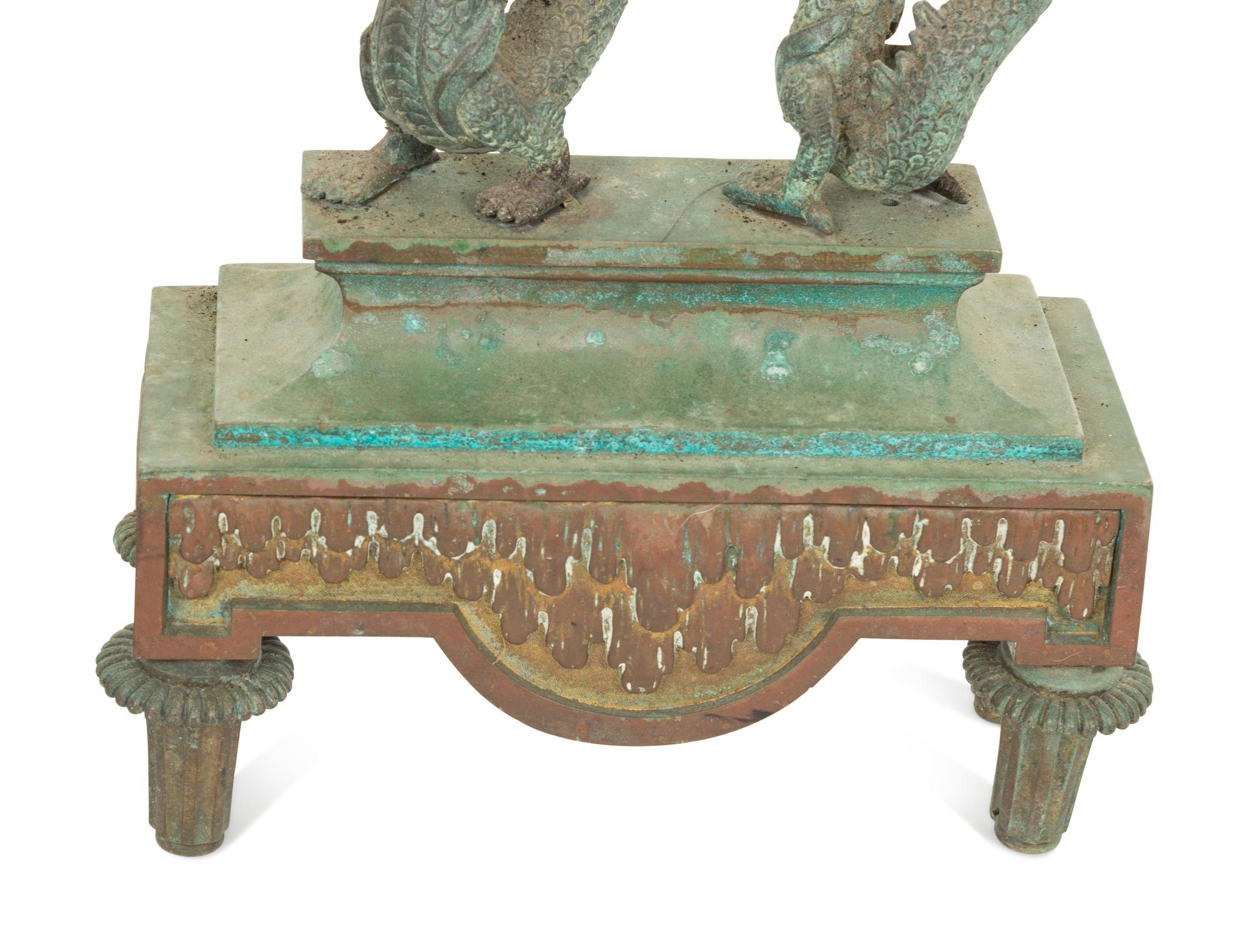 A Pair of Chinese Bronze Dragon Chenets