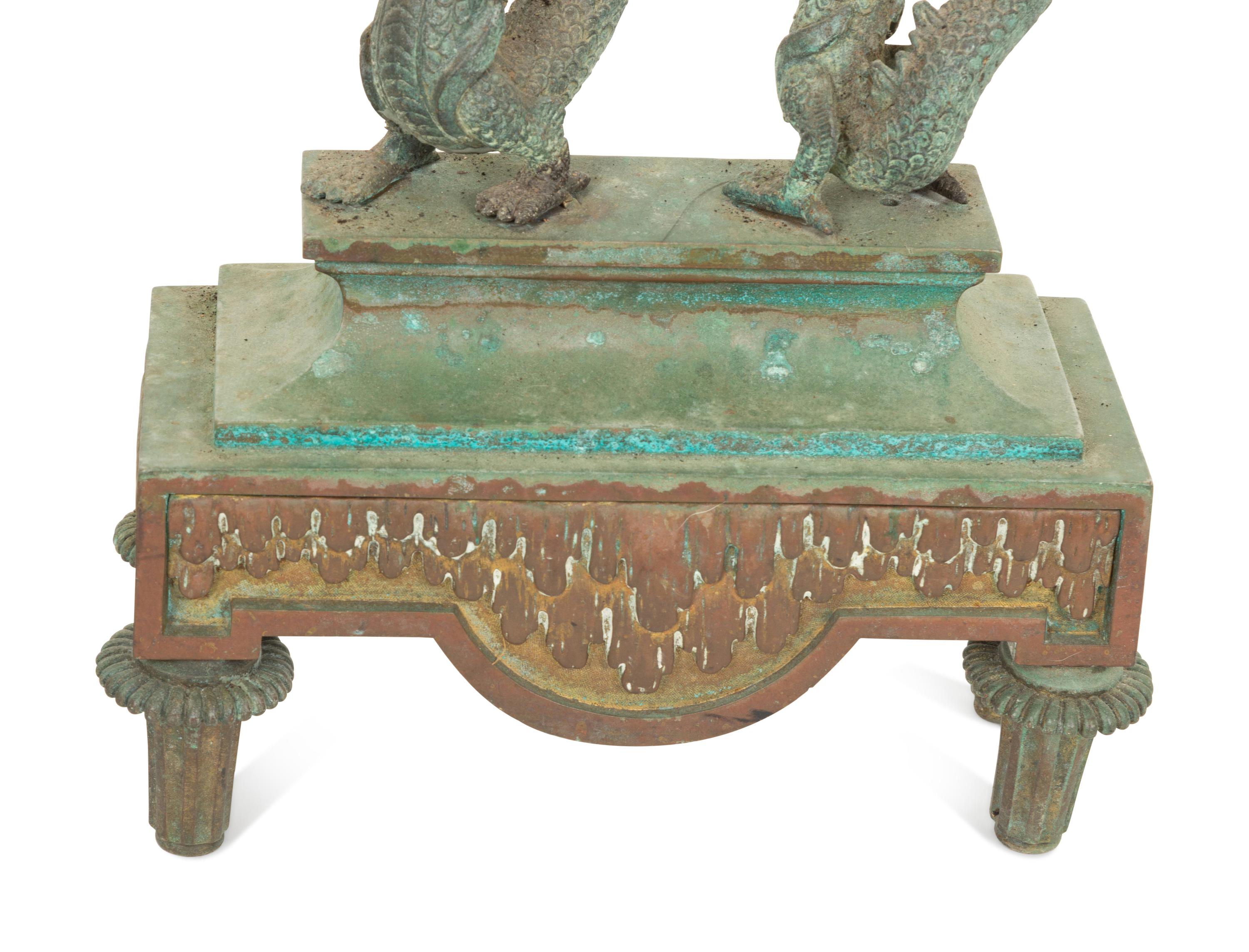 A Pair of Chinese Bronze Dragon Chenets