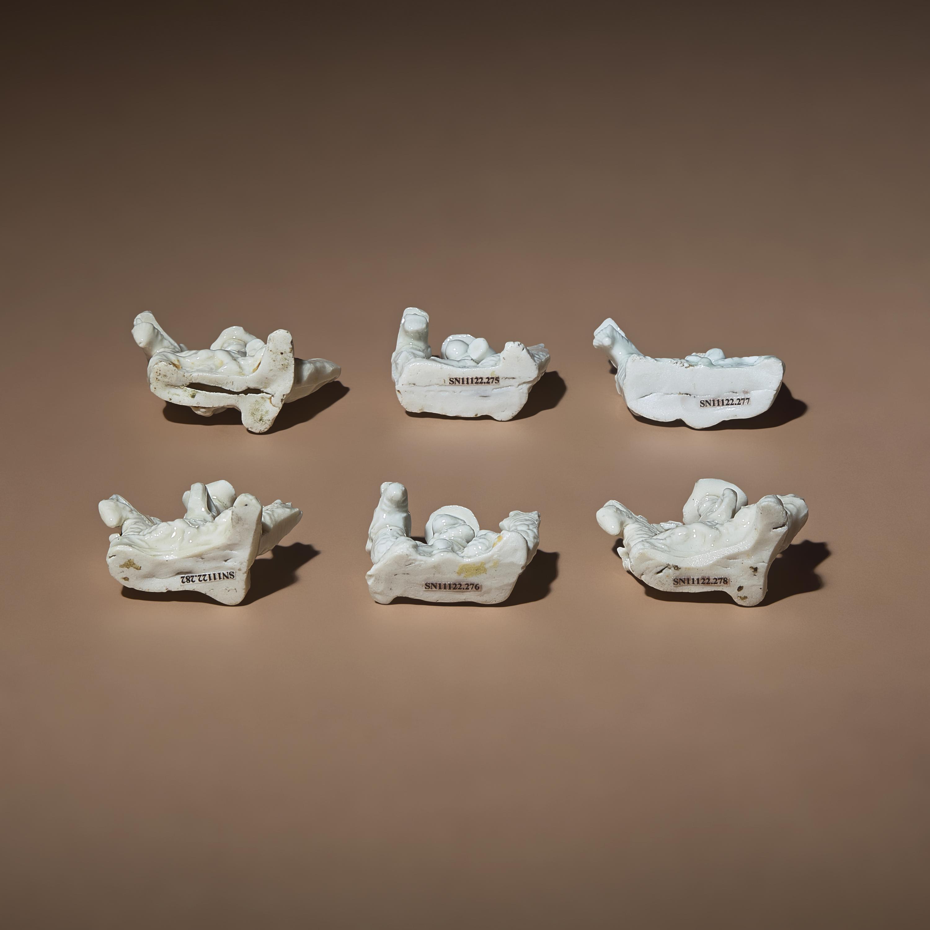 Six Chinese Blanc-de-Chine Porcelain Figural Group-Form Whistles, Late 17th-18th Century — 清早期 德化白瓷塑人像哨六件
