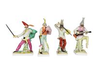 A Set of Four Continental Porcelain Commedia Dell'Arte Figures