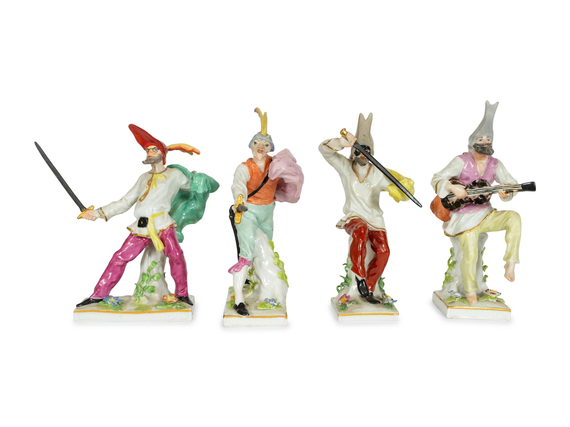 A Set of Four Continental Porcelain Commedia Dell'Arte Figures