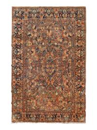 A Sarouk Wool Rug — 20TH CENTURY