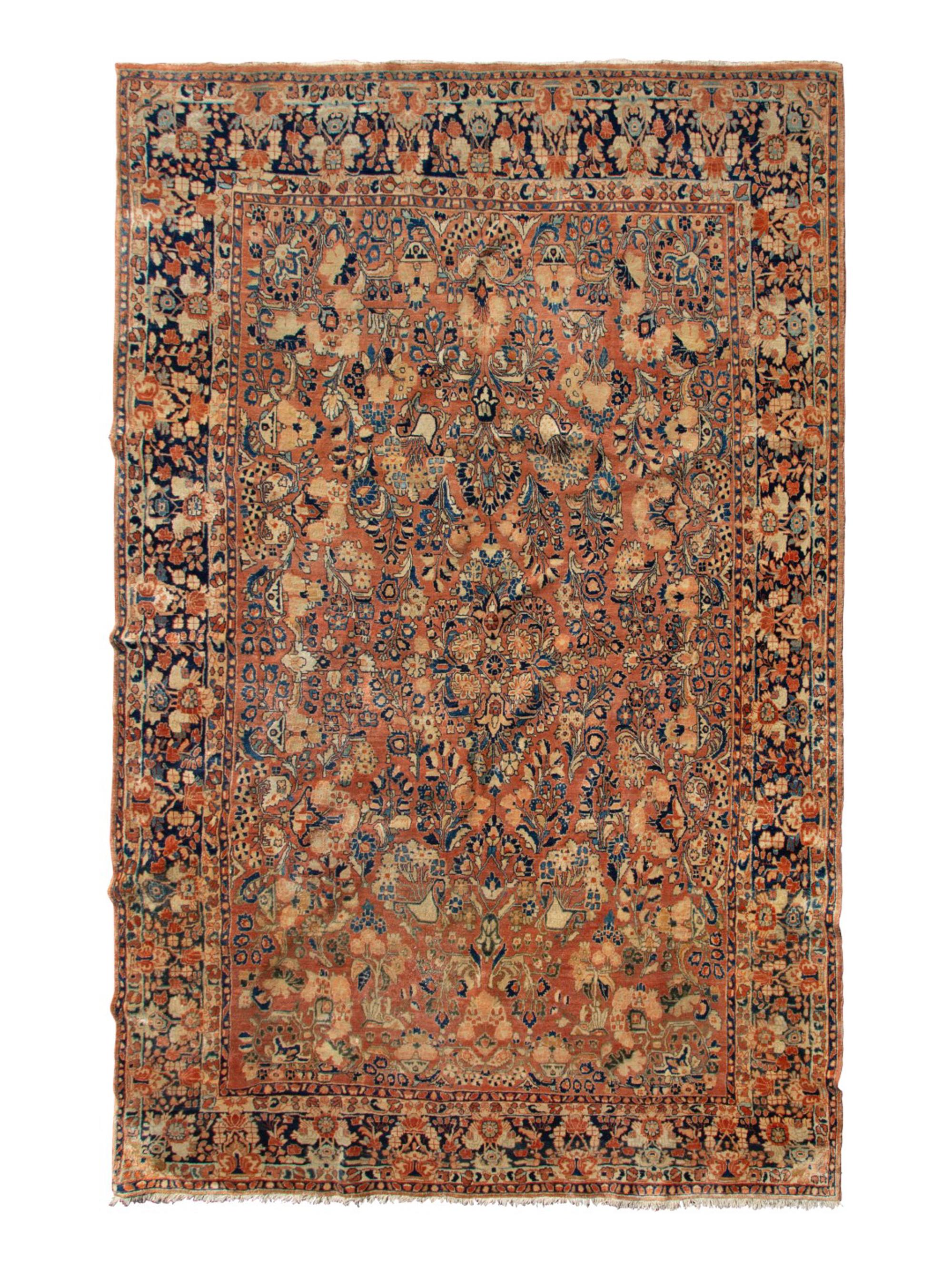 A Sarouk Wool Rug — 20TH CENTURY
