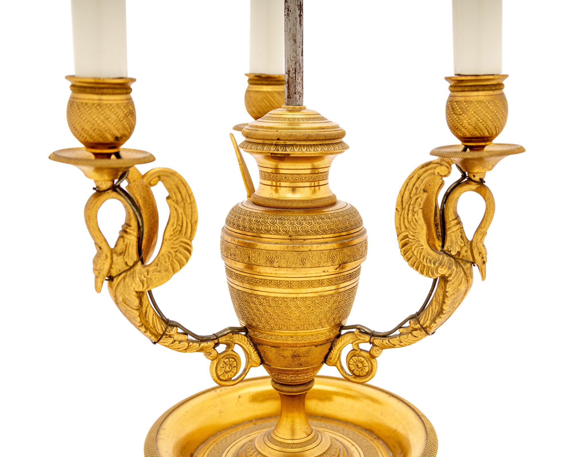 An Empire Style Gilt Metal Bouillotte Lamp with Tole Shade