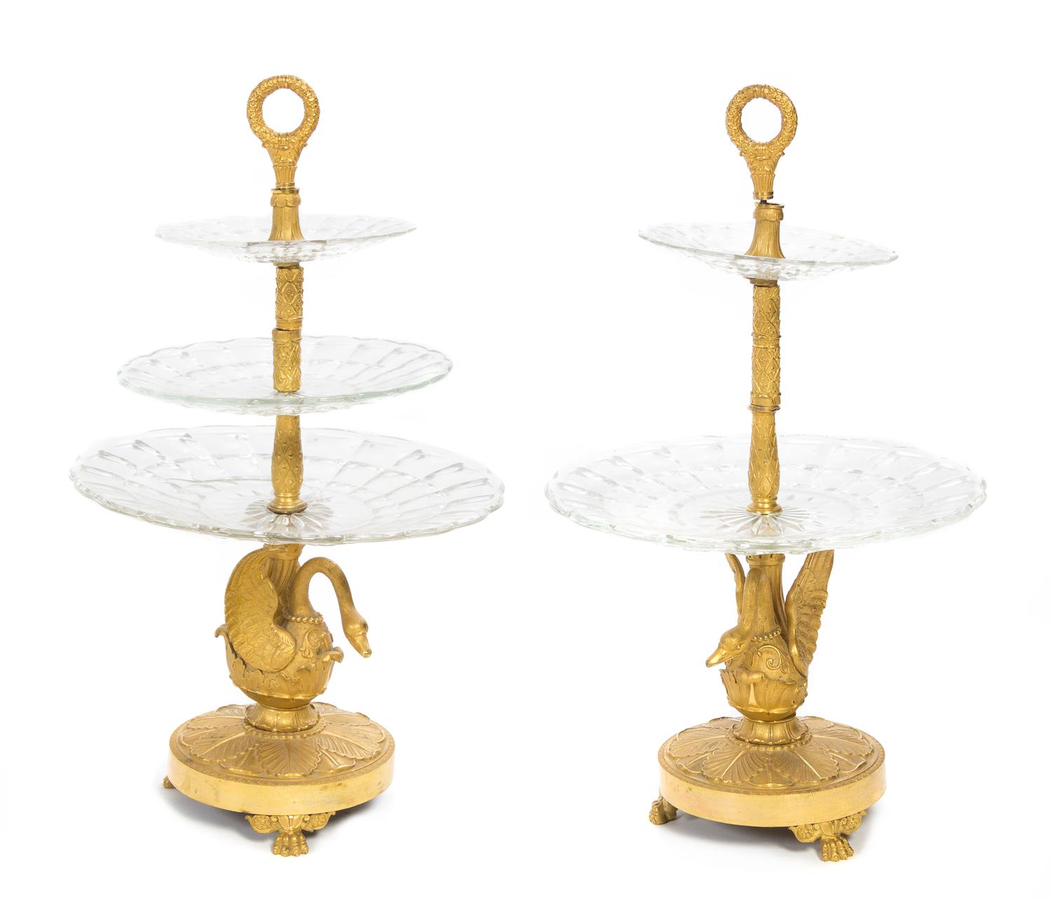 A Pair of Empire Style Gilt Bronze and Cut Glass Three-Tier Stands Height 18 inches.
