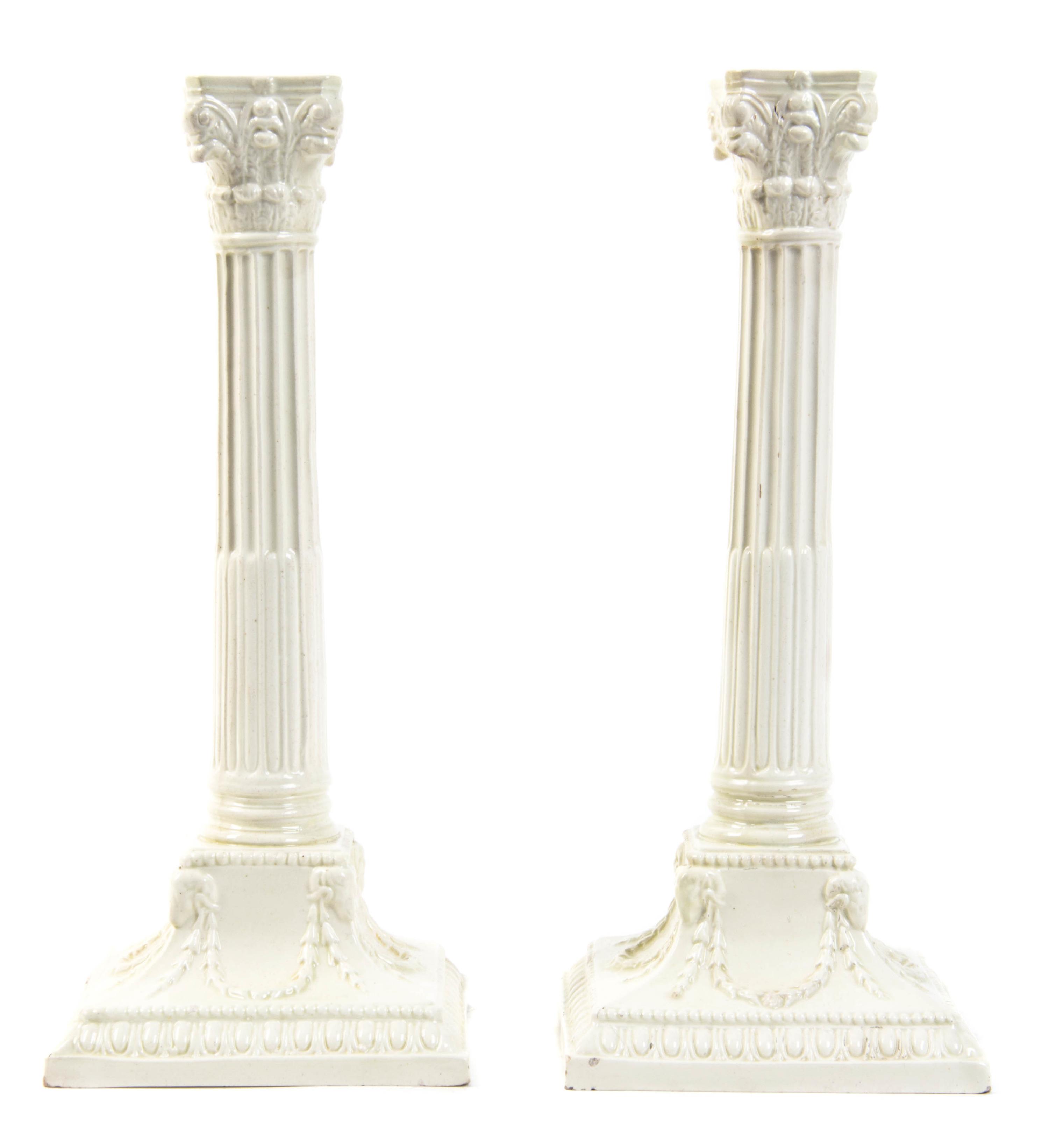 A Pair of English Creamware Candlesticks, Height 10 3/8 inches.