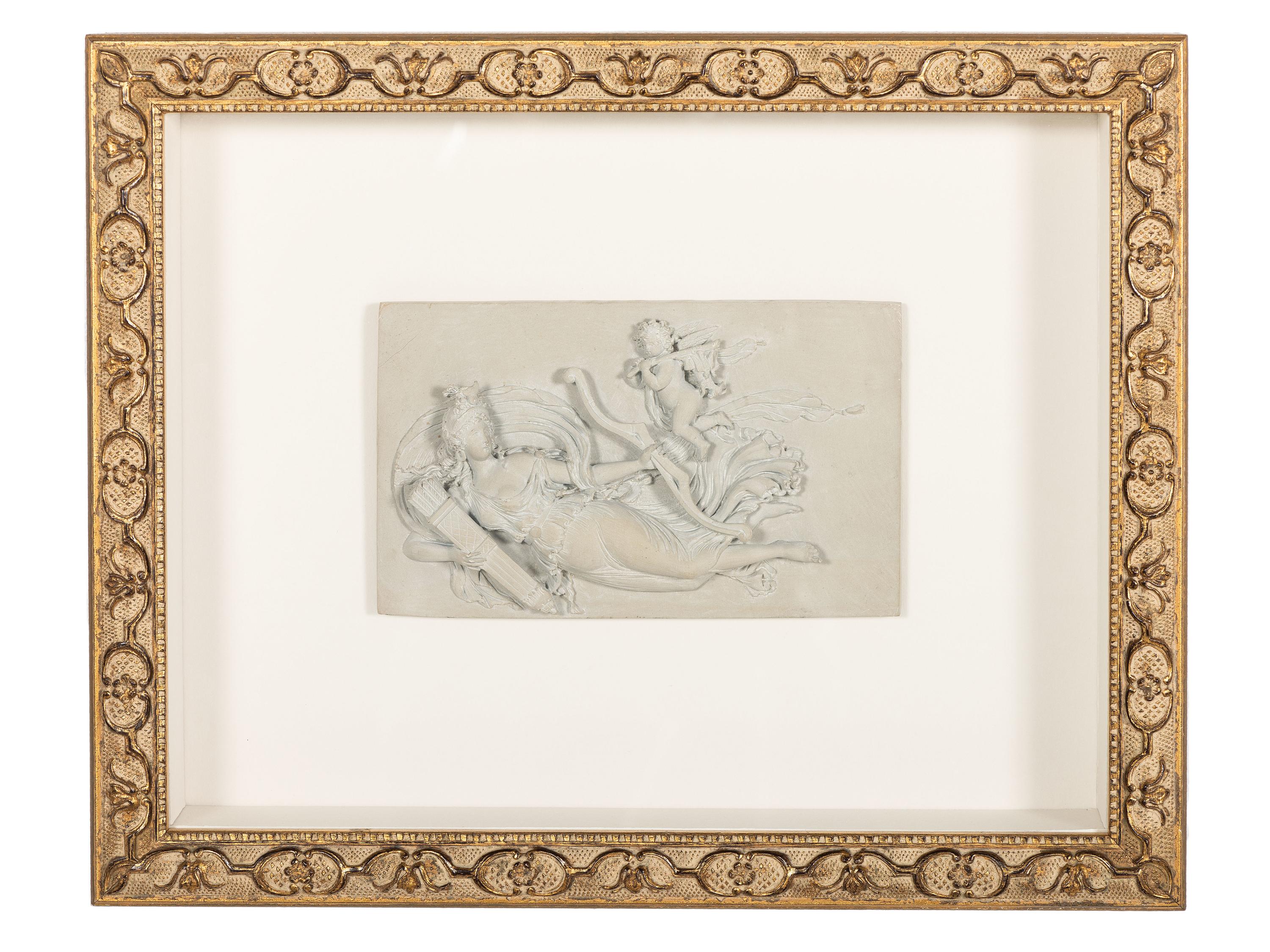 A Carved Lava Panel of Diana and Eros