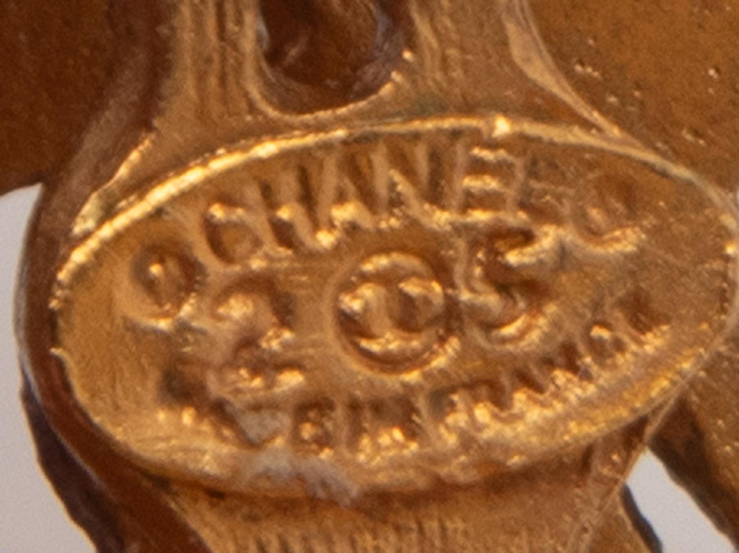Chanel Filigree Logo Ear Clips