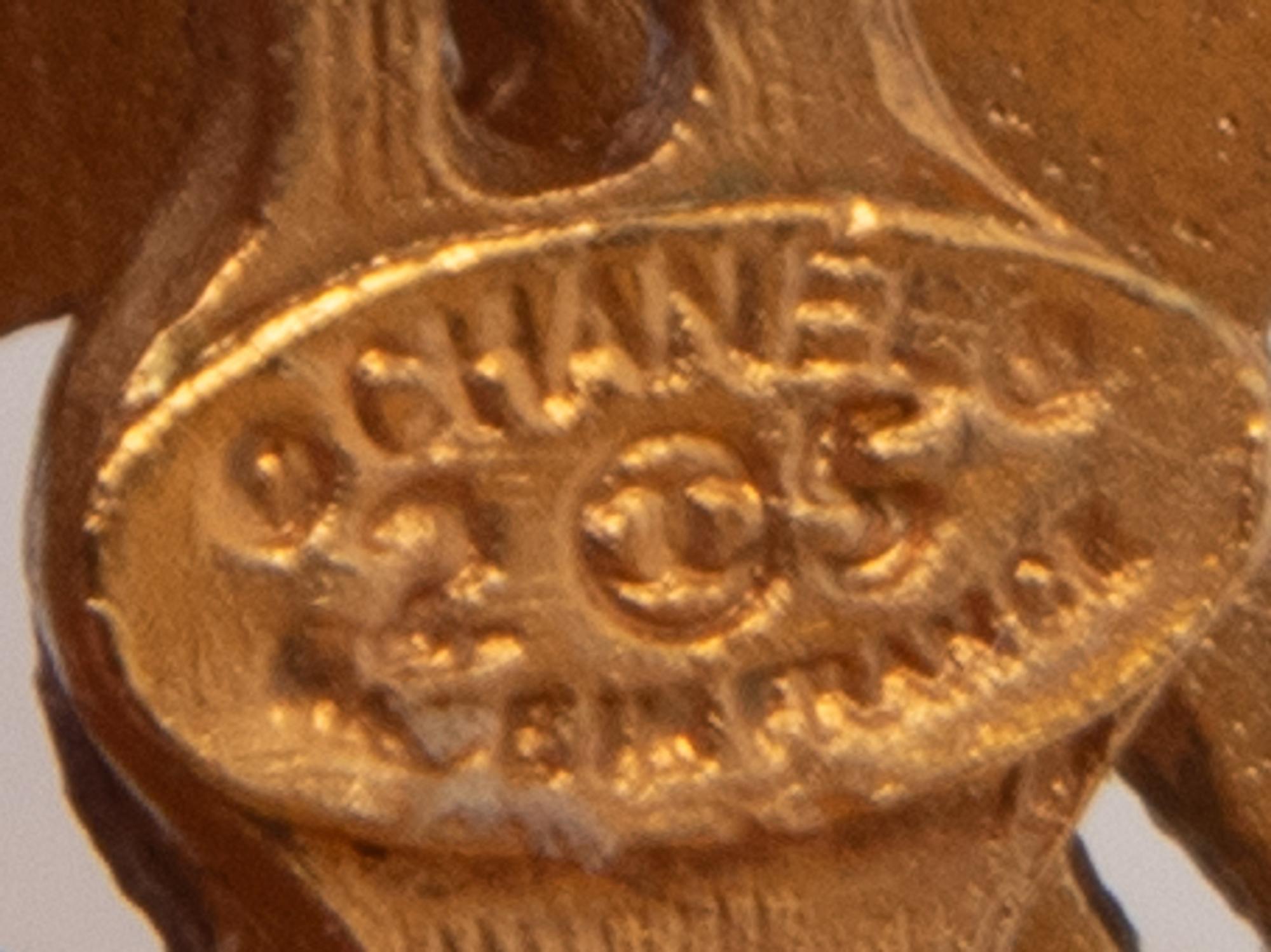 Chanel Filigree Logo Ear Clips