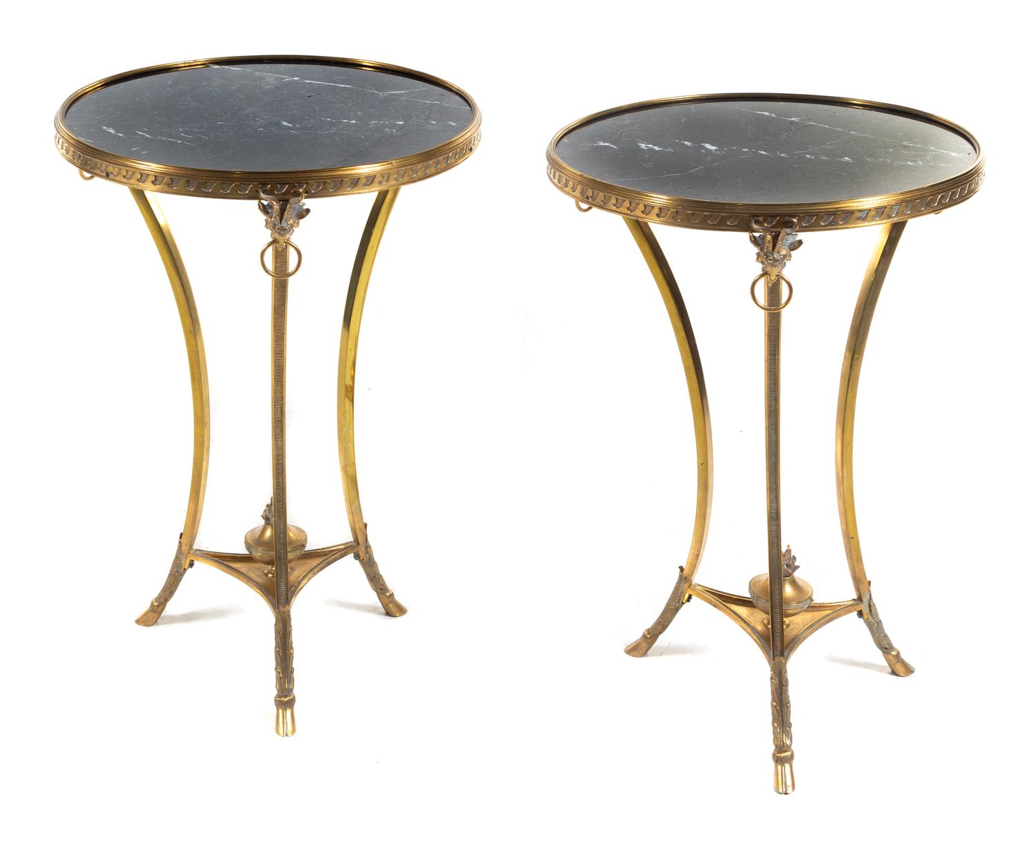 A Pair of Neoclassical Gilt Bronze Gueridons Height 29 x diameter of top 20 inches. — 20TH CENTURY