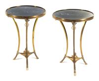 A Pair of Neoclassical Gilt Bronze Gueridons Height 29 x diameter of top 20 inches. — 20TH CENTURY