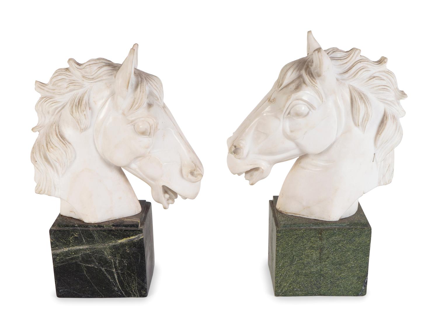 A Pair of Continental Carved Marble Horse Heads — FIRST QUARTER 20TH CENTURY