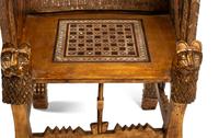 An Egyptian Style Abalone Inlaid Marquetry and Giltwood Armchair