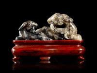 A Chinese Grey and Black Jade Figural Group of Double Rams