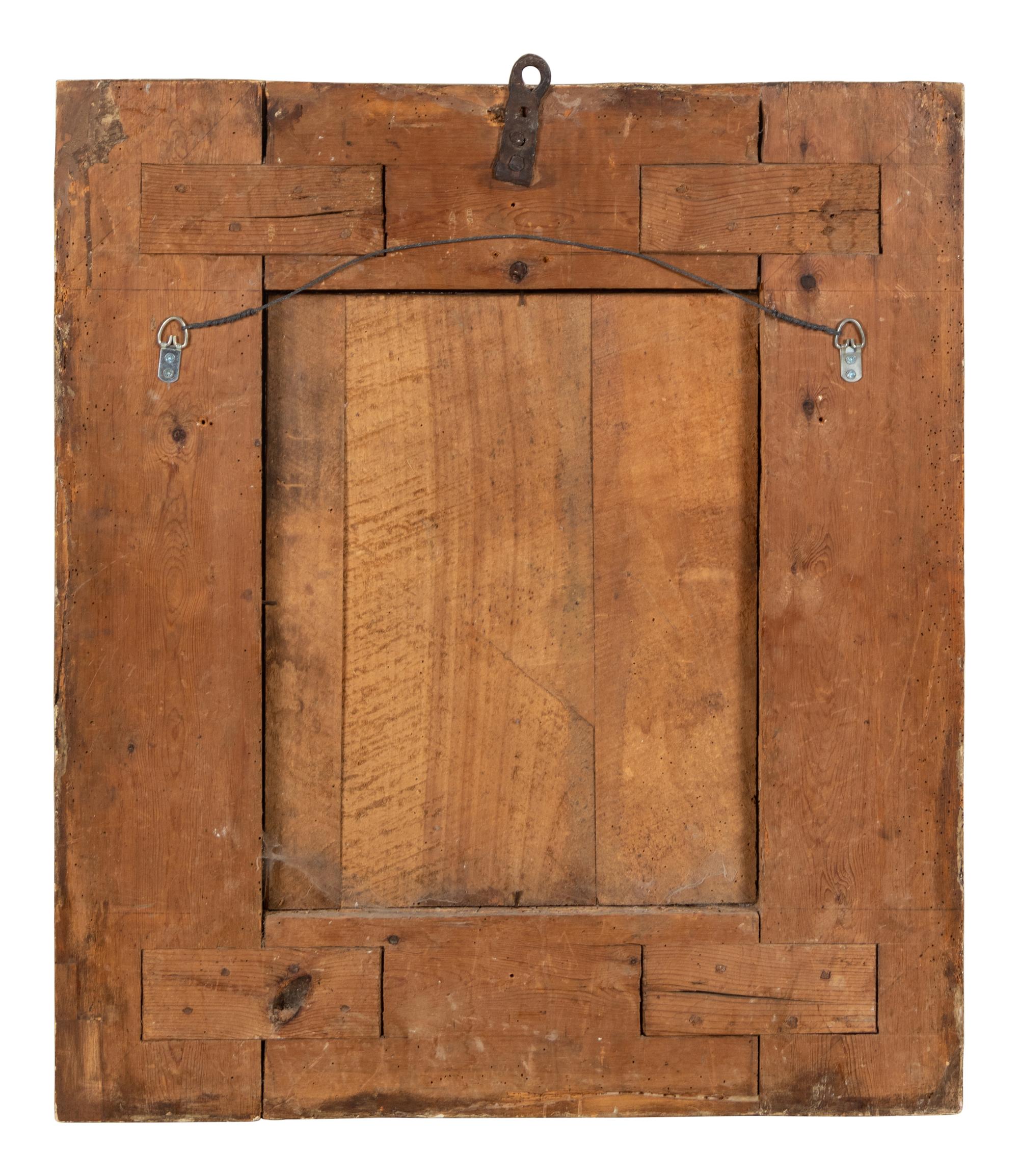 A Continental Carved Giltwood Mirror