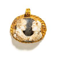 A Roman Gold and Onyx Double-Portrait Cameo Pendant